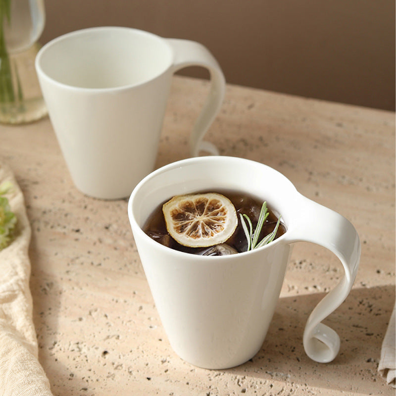European-style flowing handle creative design ceramic coffee cup