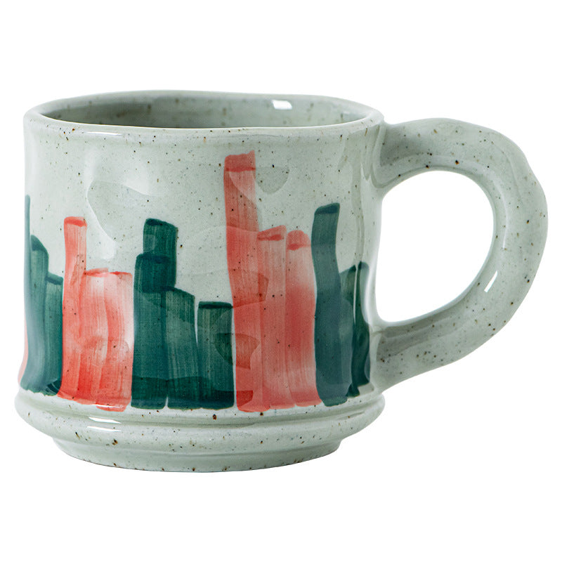 Retro earthenware coffee cup with red and green stripes